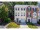 Charming townhome with well-manicured lawn, single car garage, and beautiful architectural details at 5420 Vista View Ct, Raleigh, NC 27612