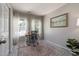 Bright office space with a large window, neutral walls and a colorful rug at 5420 Vista View Ct, Raleigh, NC 27612