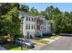 Street view of the townhome with manicured lawns and curbside parking available at 5420 Vista View Ct, Raleigh, NC 27612