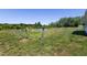 Expansive fenced backyard with a storage shed and mature trees at 5423 Nc-39, Selma, NC 27576