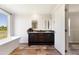 Bright bathroom features a double vanity, granite countertops, and freestanding soaking tub at 5423 Nc-39, Selma, NC 27576