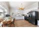 Modern kitchen featuring a breakfast nook, white cabinets, and stainless steel appliances at 5423 Nc-39, Selma, NC 27576