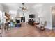 Spacious living room featuring a fireplace, hardwood flooring, and open access to other rooms at 5423 Nc-39, Selma, NC 27576