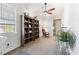 Office space featuring custom shelving and an abundance of natural light from the windows at 5423 Nc-39, Selma, NC 27576