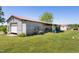 Large metal outbuilding with a red roof, providing ample space and storage at 5423 Nc-39, Selma, NC 27576