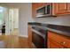 Bright kitchen features stainless steel appliances and granite countertops at 55 Derwin Dr, Timberlake, NC 27583