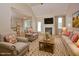 Living room featuring a fireplace and neutral furniture at 55 Derwin Dr, Timberlake, NC 27583