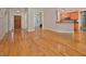 Open-concept living room with hardwood floors and a view of the kitchen at 55 Derwin Dr, Timberlake, NC 27583