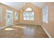 Sunroom with tile floors and lots of windows at 55 Derwin Dr, Timberlake, NC 27583