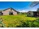 Open barn with a tractor inside on a sunny day at 5916&5918 Laws Farm Rd, Rougemont, NC 27572