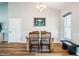 Dining room with wood floors, white walls, and a window for natural light at 5916&5918 Laws Farm Rd, Rougemont, NC 27572