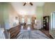 Open living space with fireplace, dining area and vaulted ceilings at 5916&5918 Laws Farm Rd, Rougemont, NC 27572