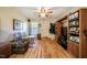 Inviting living room with natural light, wood floors and built in shelving at 5916&5918 Laws Farm Rd, Rougemont, NC 27572