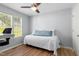Small bedroom with a daybed, a desk by the window, and wood-look floors at 624 Wait Ave, Wake Forest, NC 27587