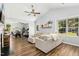 Spacious living room featuring an open layout, connecting seamlessly to the dining area and kitchen at 624 Wait Ave, Wake Forest, NC 27587