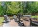 Backyard patio with comfortable outdoor seating and grilling area at 7108 Carries Reach Way Way, Raleigh, NC 27614