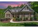 Charming brick home with manicured lawn and lush landscaping at 7108 Carries Reach Way Way, Raleigh, NC 27614