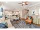 Open-concept living room offers great views to kitchen and staircase at 7108 Carries Reach Way Way, Raleigh, NC 27614