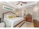 Comfortable main bedroom with dresser and ensuite bath at 7108 Carries Reach Way Way, Raleigh, NC 27614