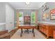 Home office featuring a large desk, ample storage, and natural light at 7108 Carries Reach Way Way, Raleigh, NC 27614