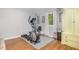 Home gym area with exercise equipment, hardwood floors, and a window with natural light at 7200 Rabbit Run, Wake Forest, NC 27587
