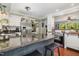 Bright and modern kitchen with a large island, stainless steel appliances, and an open layout at 7200 Rabbit Run, Wake Forest, NC 27587