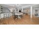 Large recreation room with bar, dining area, and seating, perfect for entertaining at 7200 Rabbit Run, Wake Forest, NC 27587