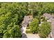 Aerial shot showcasing the property nestled among mature trees in a serene setting at 72103 Moseley, Chapel Hill, NC 27517