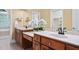Elegant bathroom with double vanity, and a soaking tub, offering a luxurious spa-like experience at 72103 Moseley, Chapel Hill, NC 27517