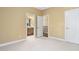 Bedroom offering ensuite bathroom and hallway entrances, plus neutral walls and carpeting at 72103 Moseley, Chapel Hill, NC 27517