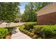 Well-maintained landscaping surrounding the house with greenery and a sidewalk at 72103 Moseley, Chapel Hill, NC 27517
