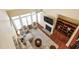 Cozy living room with fireplace, built-in shelving, and plush seating, ideal for Gathering gatherings at 72103 Moseley, Chapel Hill, NC 27517
