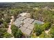 This aerial view highlights the tennis courts and swimming pool at 72103 Moseley, Chapel Hill, NC 27517