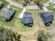 An aerial view of the house with a large yard and neighboring homes at 7616 Hasentree Way, Wake Forest, NC 27587