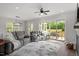 Open concept living and dining with access to outdoor patio for entertaining at 7616 Hasentree Way, Wake Forest, NC 27587