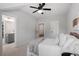 Bedroom features a large bed with ensuite bathroom at 7616 Hasentree Way, Wake Forest, NC 27587