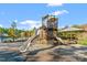 Community playground with slides and climbing structures, perfect for outdoor activities at 7616 Hasentree Way, Wake Forest, NC 27587