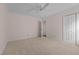 Neutral bedroom with carpet, ceiling fan, and closet, offering a blank canvas for personalization at 804 Warwick Ct, Burlington, NC 27215