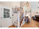 Entryway with hardwood floors, staircase, and decorative accents at 829 Joyner Ct, Wake Forest, NC 27587