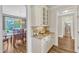 Elegant dining room with wood floors, chandelier, and built-in buffet with granite countertop at 1012 Wandering Way, Rolesville, NC 27571