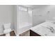 A bright bathroom with double sinks and shower-tub combination, designed for convenience and comfort at 1013 Fieldmere Pl, Wendell, NC 27591