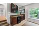 Finished basement featuring a wet bar with granite countertop at 103 Tremont Cir, Chapel Hill, NC 27516