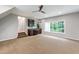 Finished basement boasts a wet bar, carpeted floors, and a bright window at 103 Tremont Cir, Chapel Hill, NC 27516