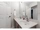 Bathroom featuring double sinks, modern faucets, and neutral wall colors at 103 Tremont Cir, Chapel Hill, NC 27516