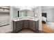 Bathroom featuring double sinks, large mirrors, and ample storage at 103 Tremont Cir, Chapel Hill, NC 27516