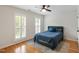Well-lit bedroom with hardwood floors and shutters on the windows at 103 Tremont Cir, Chapel Hill, NC 27516