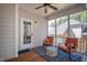 Inviting porch with wood flooring, a ceiling fan, and comfortable seating at 103 Tremont Cir, Chapel Hill, NC 27516