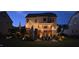 Beautiful backyard with patio, string lights, and covered porch, perfect for outdoor entertaining at 106 Mesquite Dr, Durham, NC 27703