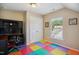 bedroom with colorful play area, desk and plenty of natural light at 106 Mesquite Dr, Durham, NC 27703
