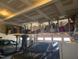 Spacious garage with overhead storage racks for convenience, plus two cars at 106 Mesquite Dr, Durham, NC 27703
